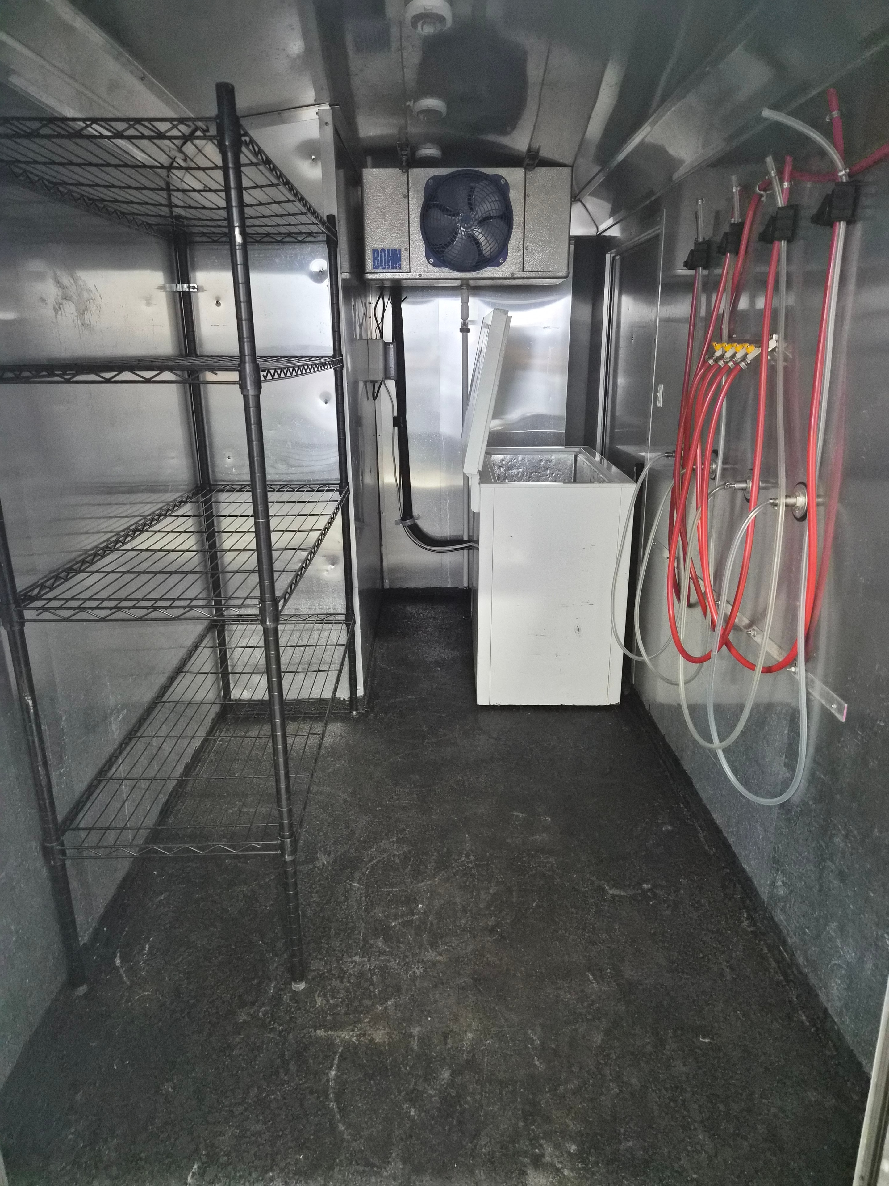 Shelving and freezer available — can be removed for additional storage.